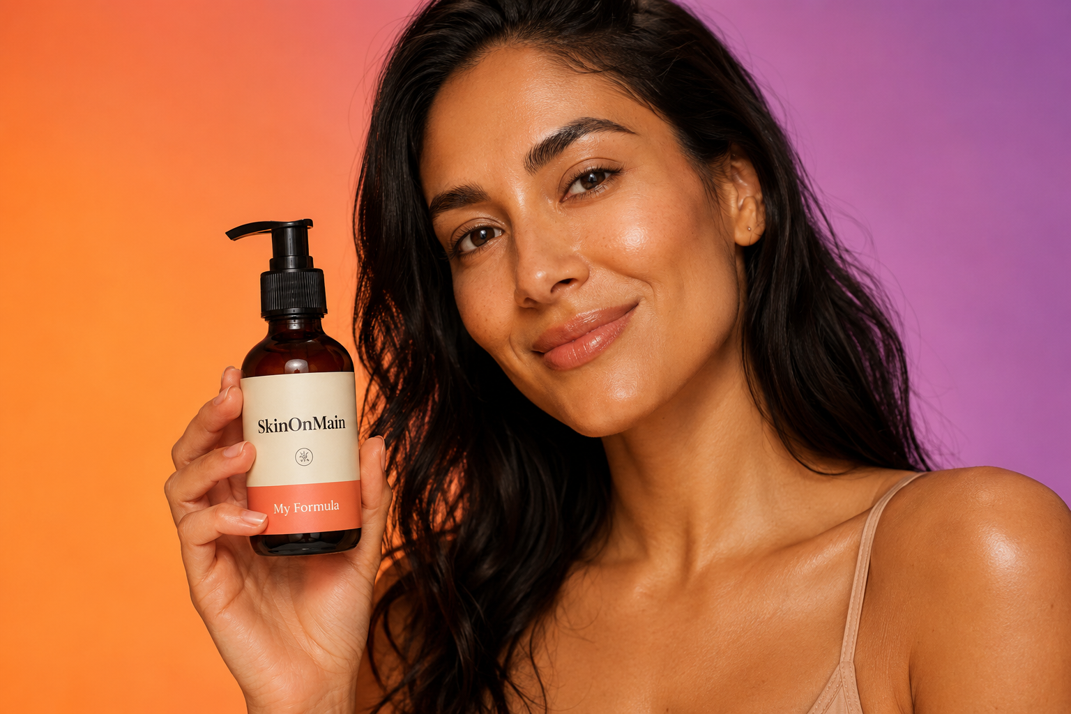 Woman holding her personalized SkinOnMain formula bottle